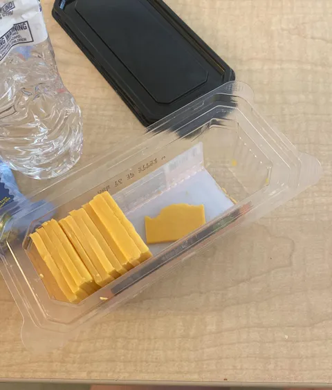 someone at work labeled my cheese as theirs with a sticky note and ate half of it