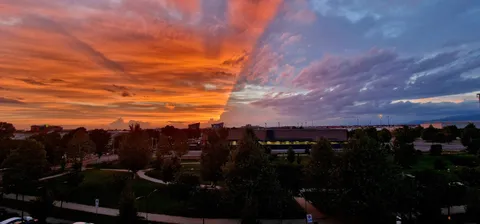From my own balcony: Verona, Italy. A cloud positioned itself just right for this to look the way it does