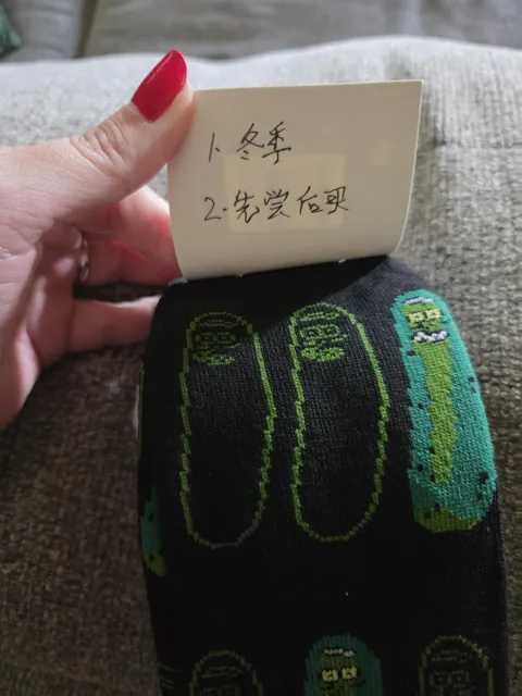 I bought my husband Pickle Rick socks and there was a handwritten Chinese note inside.