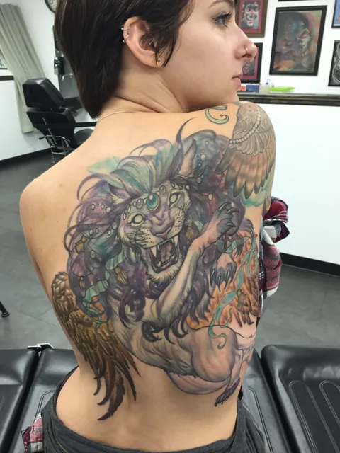 Cosmic Lion back piece by Callie (formerly of High Resolution tattoo in Baton Rouge, LA)