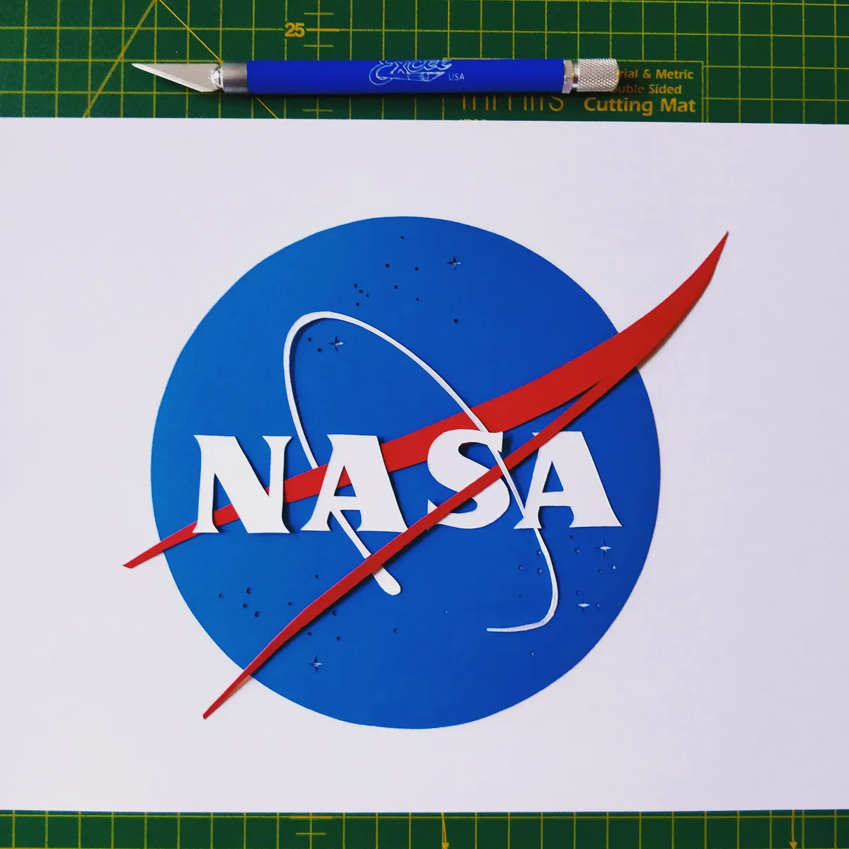 Made this NASA paper cutting today using a craft knife.