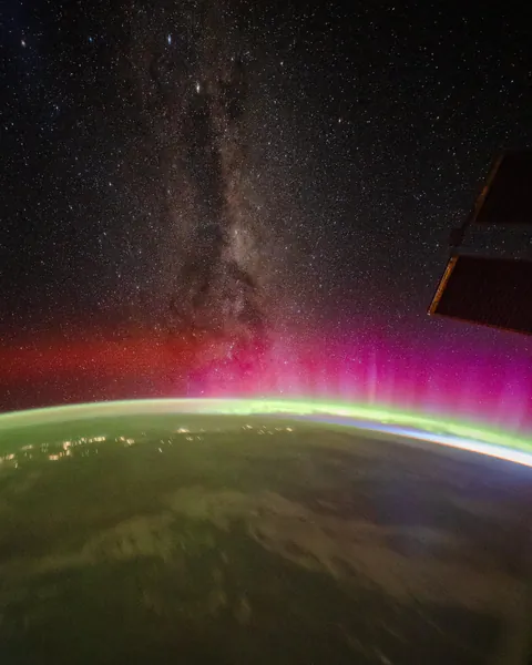 Auroras meeting the Milky Way galaxy, shot from the ISS. More details in comments!