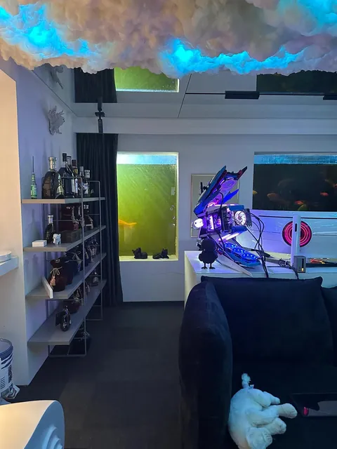 an open-air build with two ultrawide monitors