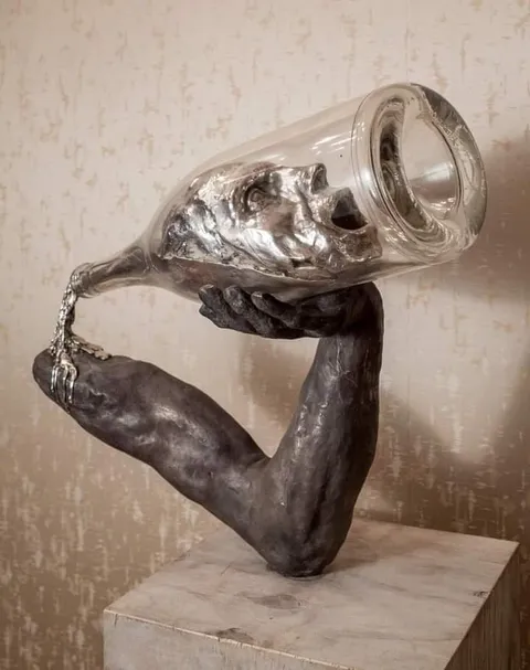 "First the man takes the drink, then the drink takes the man." Sculpture created based off an old Irish saying.