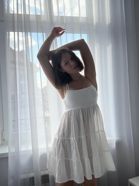 The sun's rays caress my waist