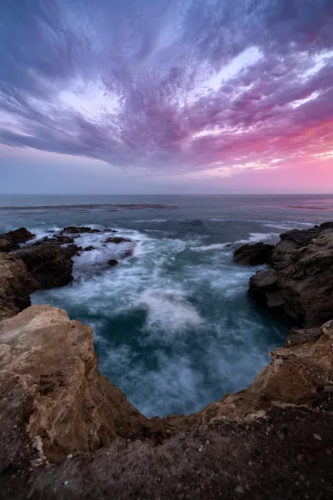 Above a Cave at Leo Carrillo Beach, California [2000x3000] [OC]