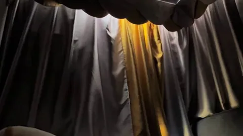 Car curtains left a chink small enough to act as a pinhole camera, projecting street views onto the car roof