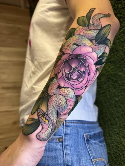 Rainbow snake done by me, Britt Tigera at Quill and Dagger tattoos in Collingwood On.