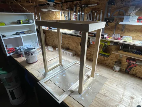 I made my self a night stand table with a tile from lowes and some scrap wood out pallets