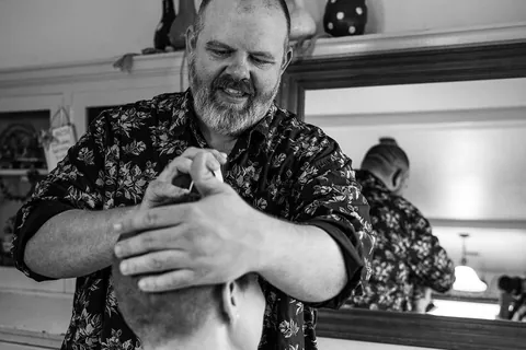 Shaving my head after week one of chemo