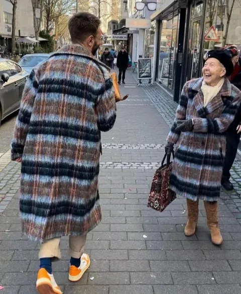 Her smile shows how this interaction made her day. 