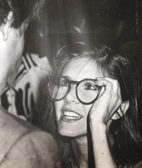 Carrie Fischer Trying On Harrison Ford’s Glasses (1980s)