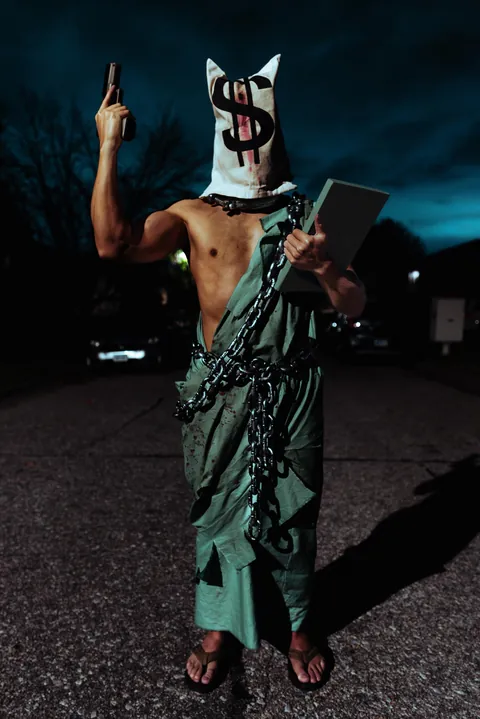 [OC] [Halloween] Liberty chained, bagged, and shot. Brought to you by frustration with my red state