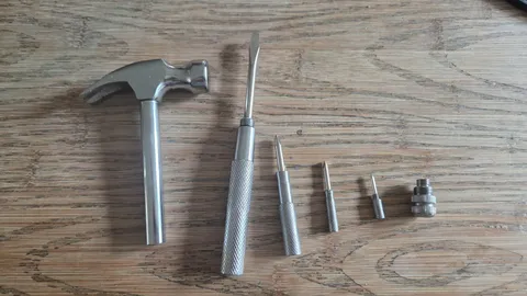 This Hammer my mom has houses a Russian nesting doll-style screwdriver set within