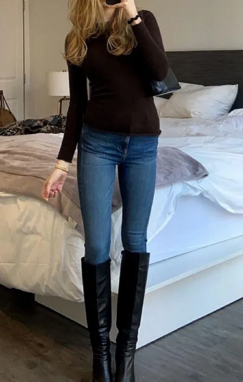 Are skinny jeans tucked into tall boots unfashionable?