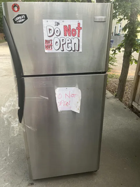Someone left this fridge in our apartment parking lot