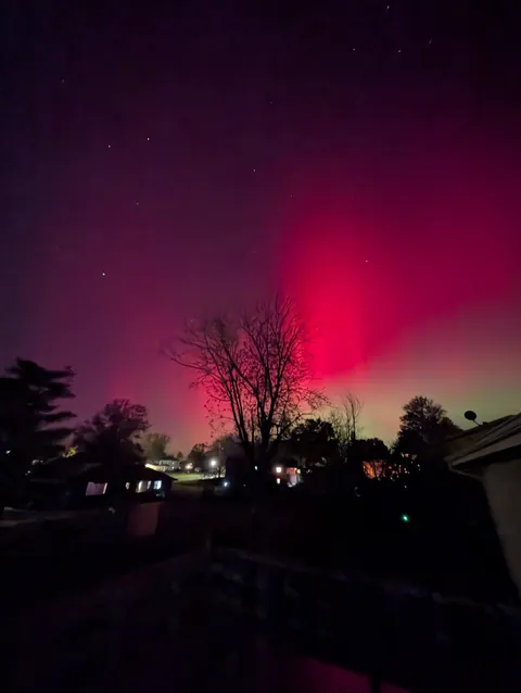 Aurora Borealis is visible in Iowa right now. This is the first time I've seen it.