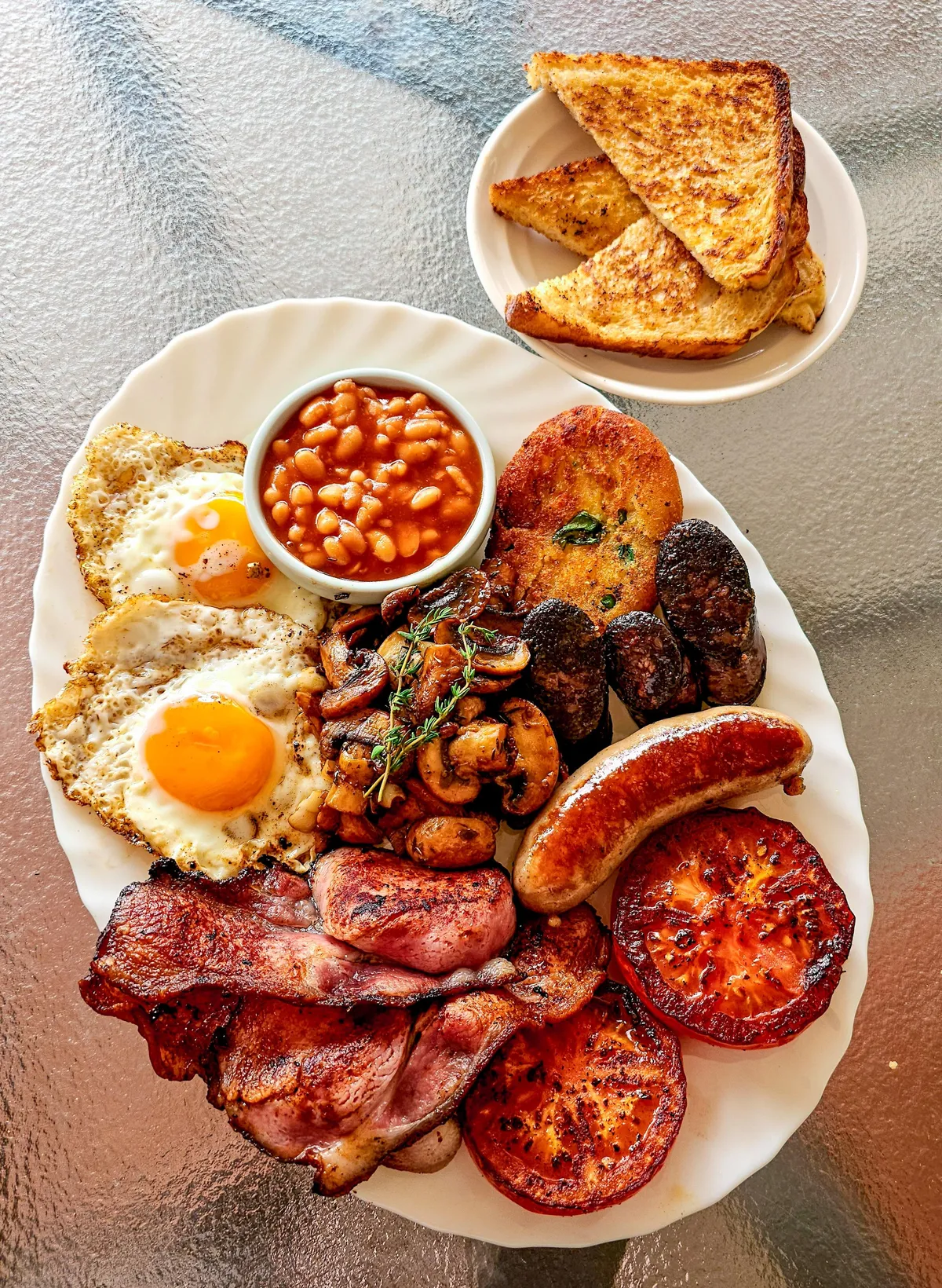 G'day, an Aussie here. I tried my hand at a full English breakfast, how did I do?