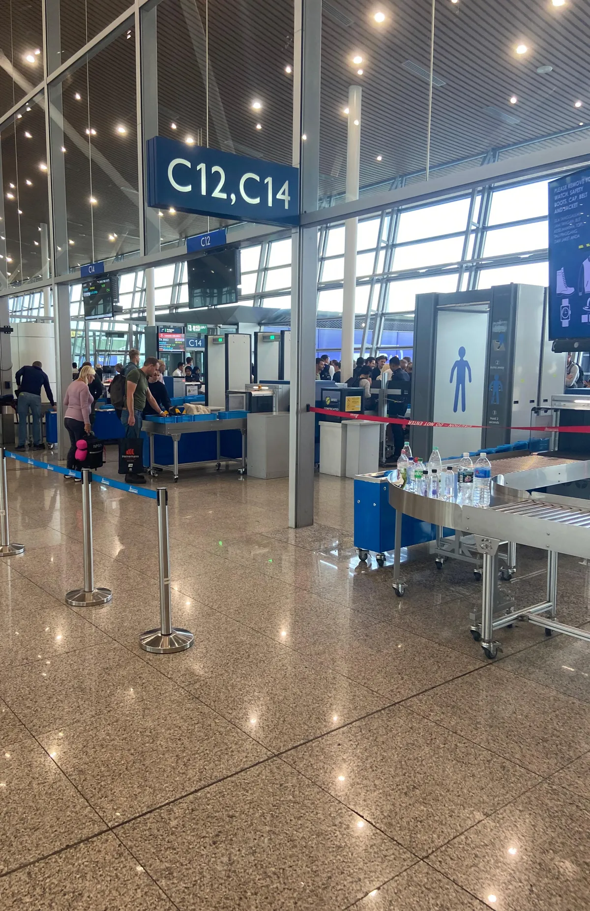 A security check right before entering our gate. meaning we cant take water with us that we bought at the airport.