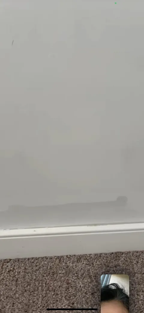 Hired a guy to paint inside my house. No refunds since he says the job is fine