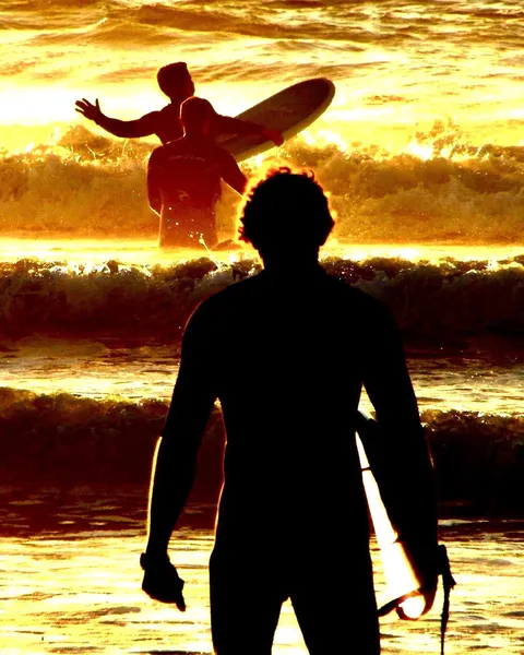 ITAP of surfers heading out for the waves