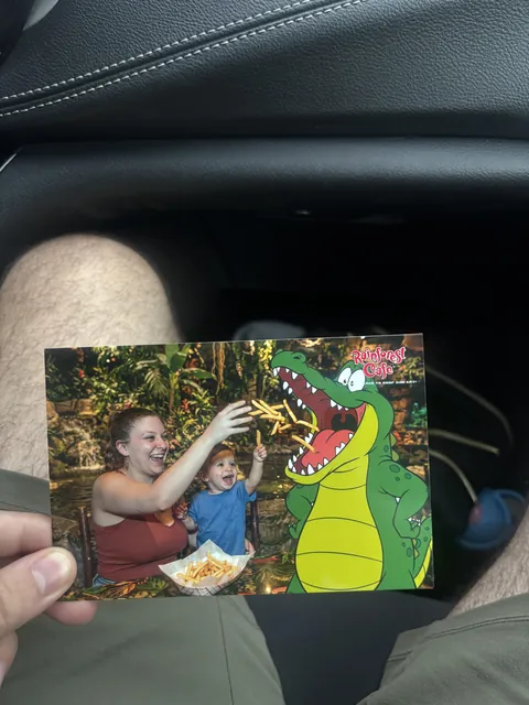 Lectured about the environment in Disney’s Animal Kingdom - then got sold a $12 AI generated photo of my “family”