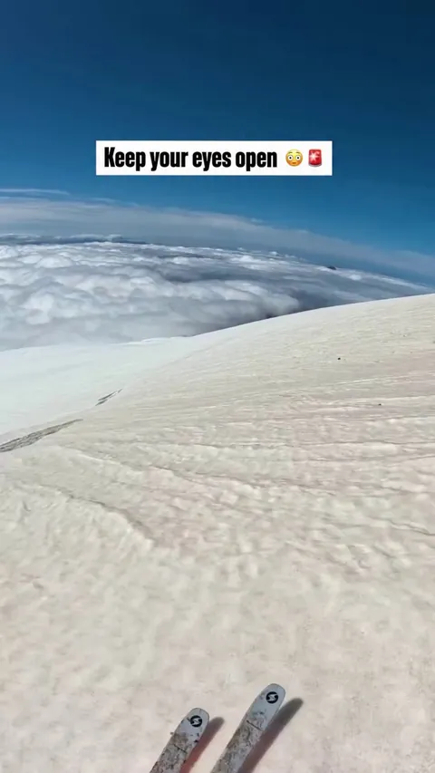 Skier narrowly avoids a crevasse.