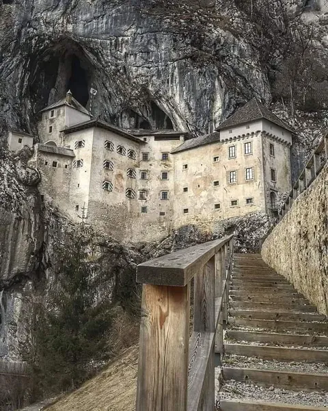 Predjama Castle in Slovenia has stood on a 123-meter cliff for 800+ years, making it the largest cave castle in the world!