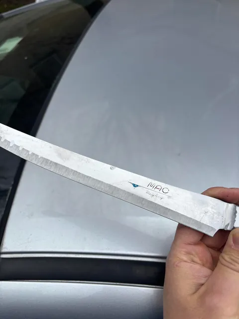 Took my expensive knife to a local sharpener. This is how it came back.