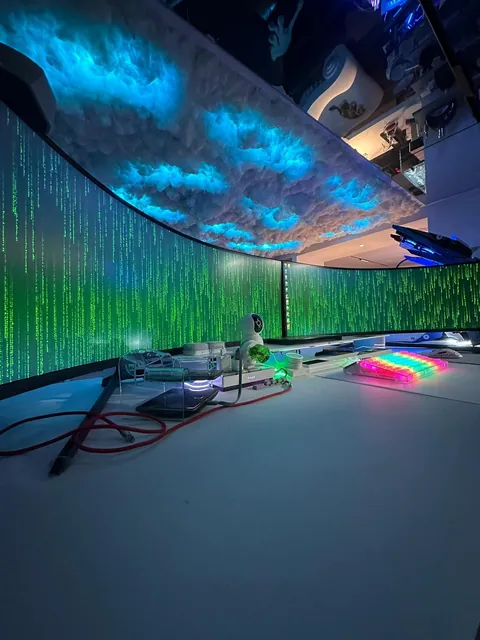 an open-air build with two ultrawide monitors