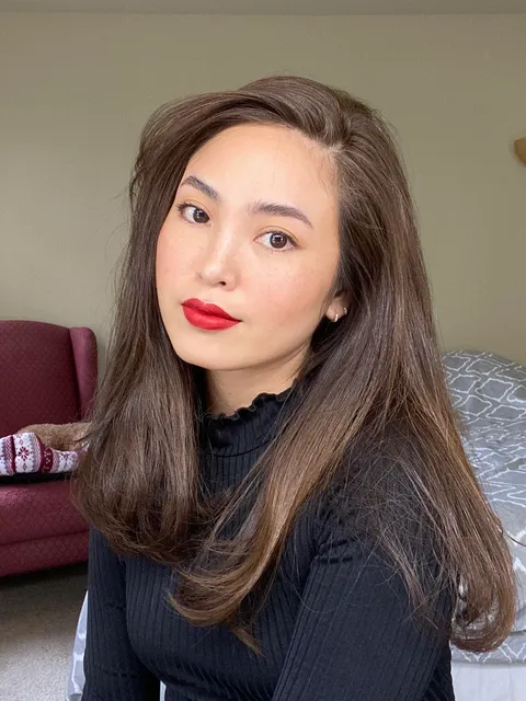 A classic red lip and everything else left very natural.