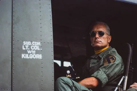 Robert Duvall (as "Col Kilgore") in a helicopter on the set of Apocalypse Now, 1976.