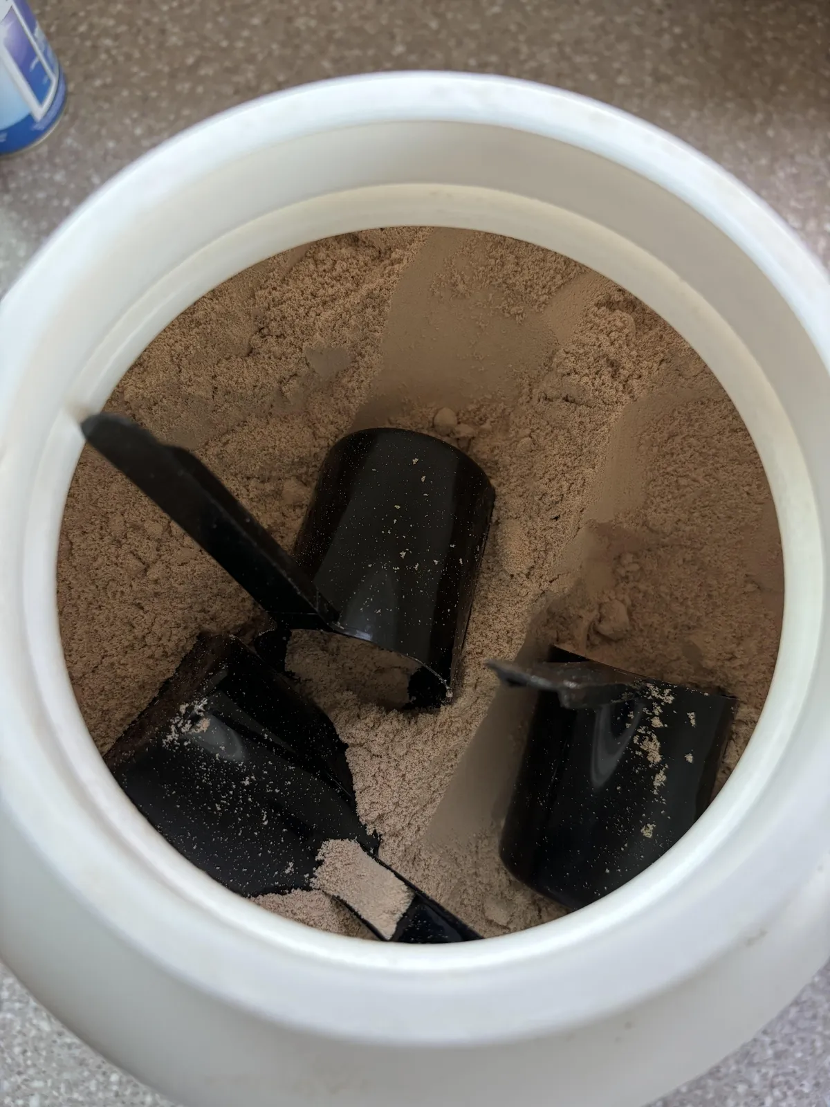 My protein powder came with three scoops