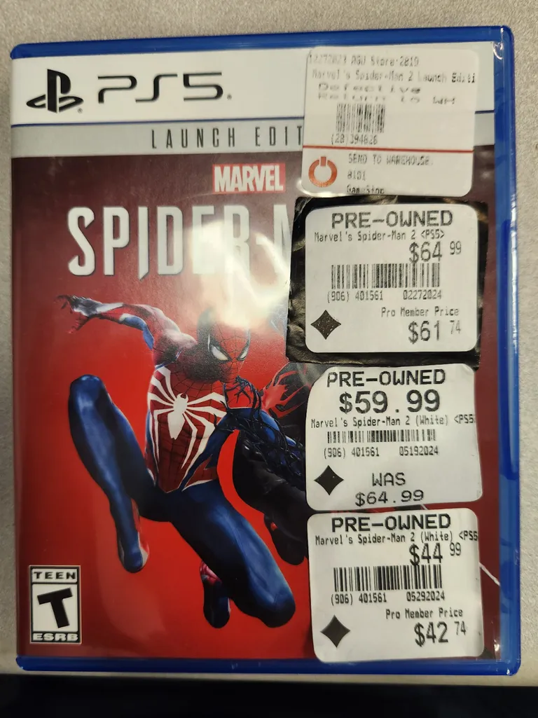 The various GameStop stickers I peeled off the game I bought (chronologically top to bottom)