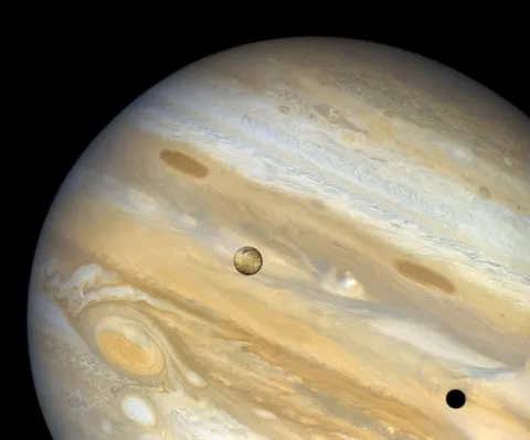 Io and its shadow on the Jupiter. Seen by Voayager-1 in 1979. Credit: NASA/JPL /Ian Regan