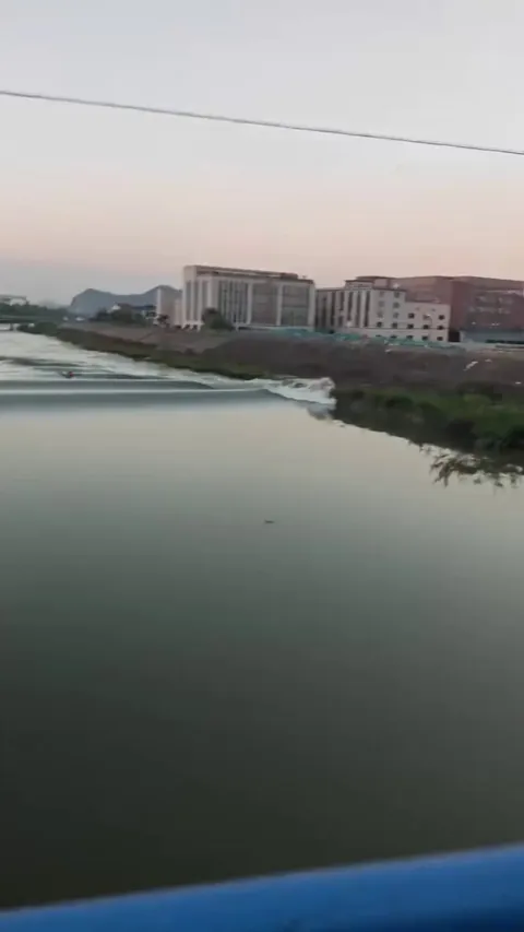 A lone kayaker riding the tide