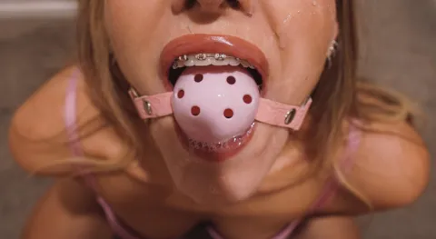 Braces look so sexy wrapped around a ball gag