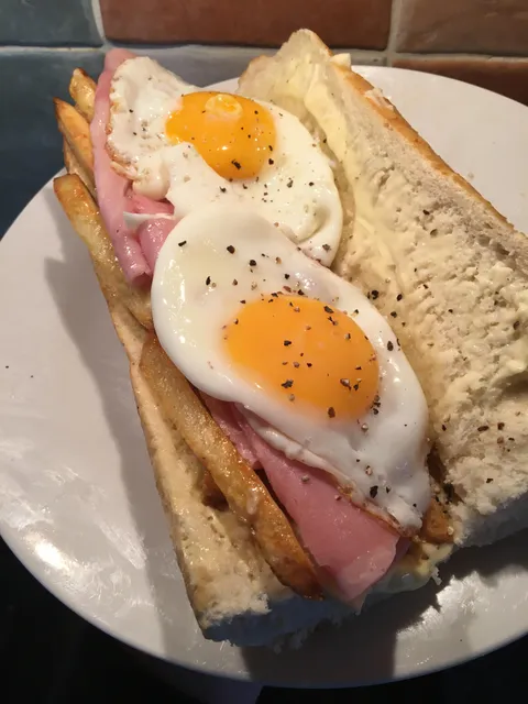 Ham, egg and chips in a fresh baguette