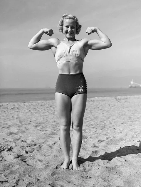 Photos of Stunt woman and athlete Relna Brewer Mcrea during her prime in Santa Monica, California, 1946. 5ft 2in and 110 pounds, could hold over 120 on one hand