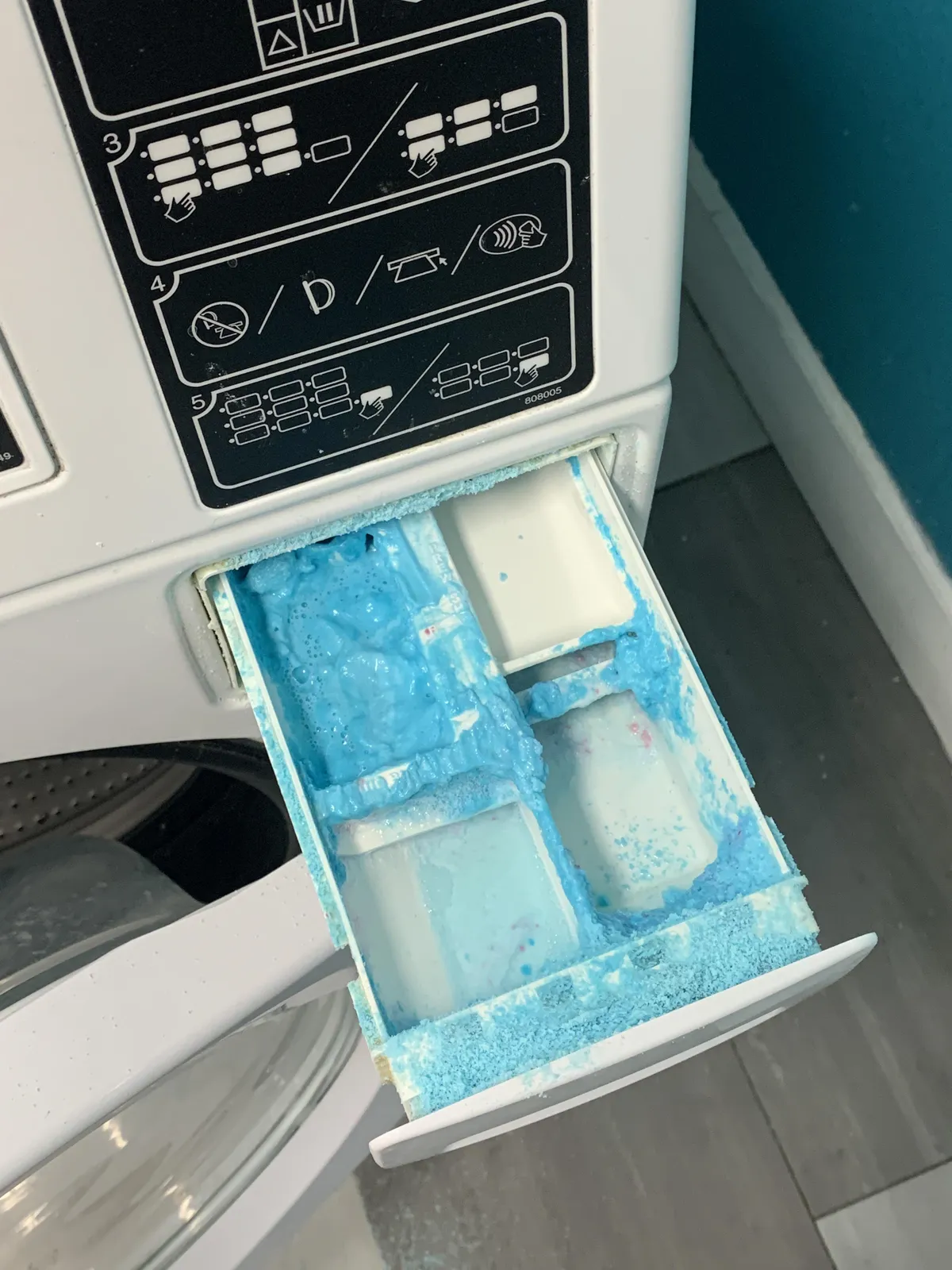 Someone in my complex keeps putting powder in the detergent tray. Every washer looks like this.