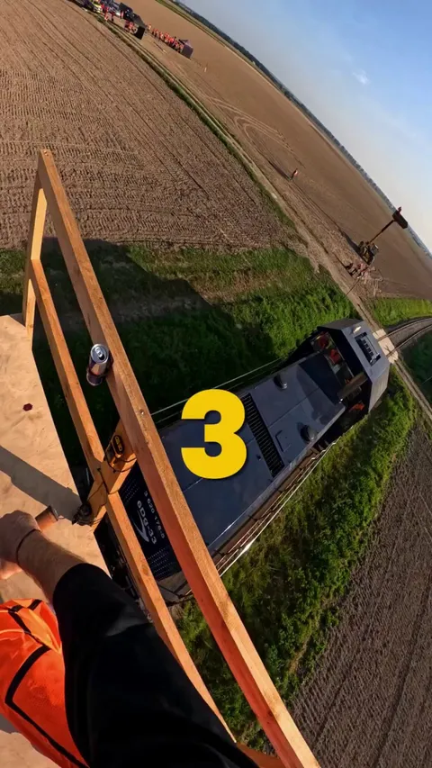 POV: Dawid Godziek riding a bike on a moving train