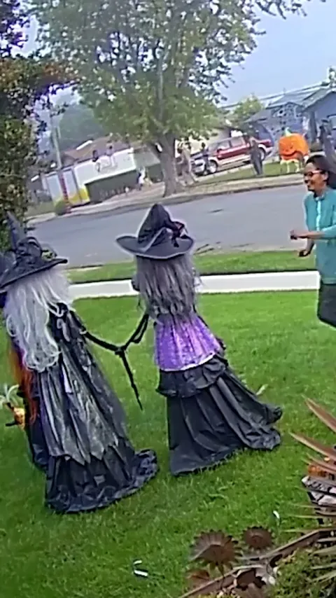 Jogger knocks down Halloween decorations for no apparent reason