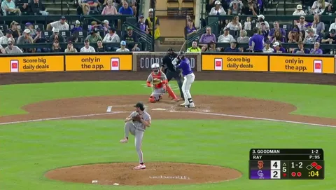 Rockies Tyler Freeman collides with Giants catcher Patrick Bailey on a play at the plate. After the collision, Freeman touches home plate for the run. Both stayed in the game.