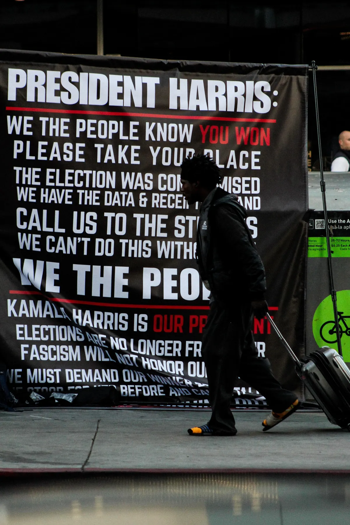 tried to capture the mood outside Kamala Harris’ book tour stop in Los Angeles on Monday [OC]