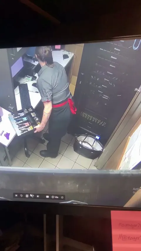 Cashier worker drops the money on the floor