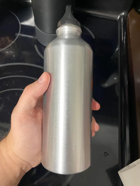 Got free water bottle. Excited to use it. Metallic flakes shedding on the inside.