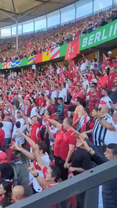 Thousands of Turkish fans making the Grey Wolf sign in their game against Netherlands yesterday