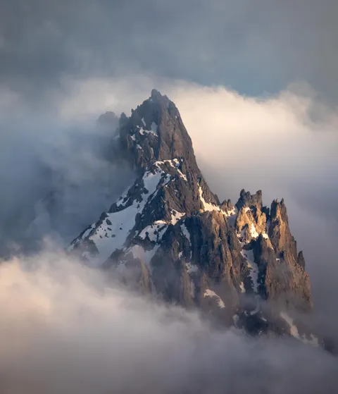 Sunrise in the French Alps, taken during a multi-day backpacking trip [OC] [2400x2796]