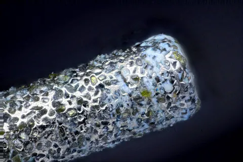 This is the diamond dental drill my dentist gave me after fixing my tooth. Magnified quite a lot.