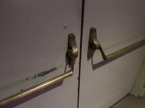 All the wedding rings dinging up a theatre door